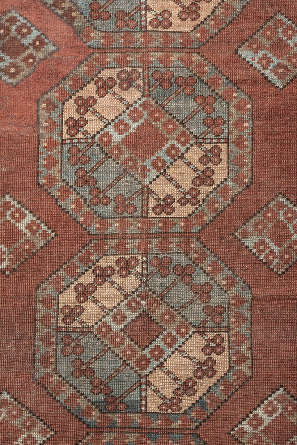 7' x 9' one-of-a-kind handmade vintage Afghan rug. Color palette: terracotta, ivory, blue gray, rust, taupe, camel, brown