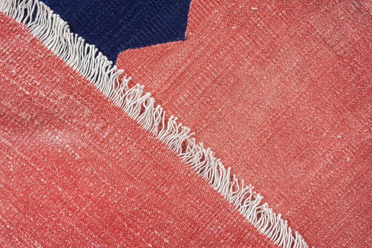 9' x 15' one-of-a-kind handmade antique Cot Dhurrie rug. Color palette: indigo, coral, rose, navy, ivory, purple, terracotta