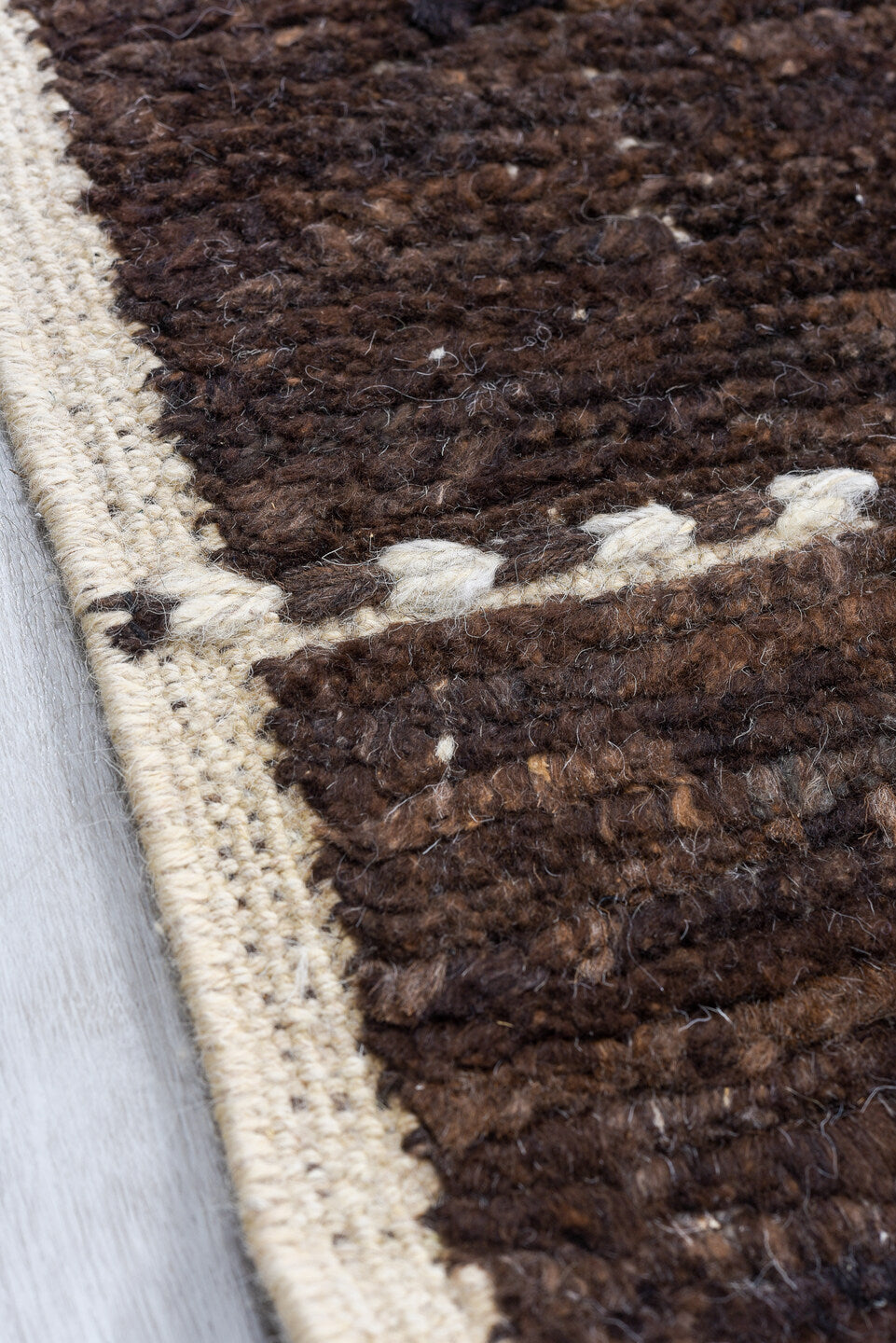 8' x 9' one-of-a-kind handmade vintage Tulu rug. Color palette: brown, ivory, espresso, taupe, black, beige, gray