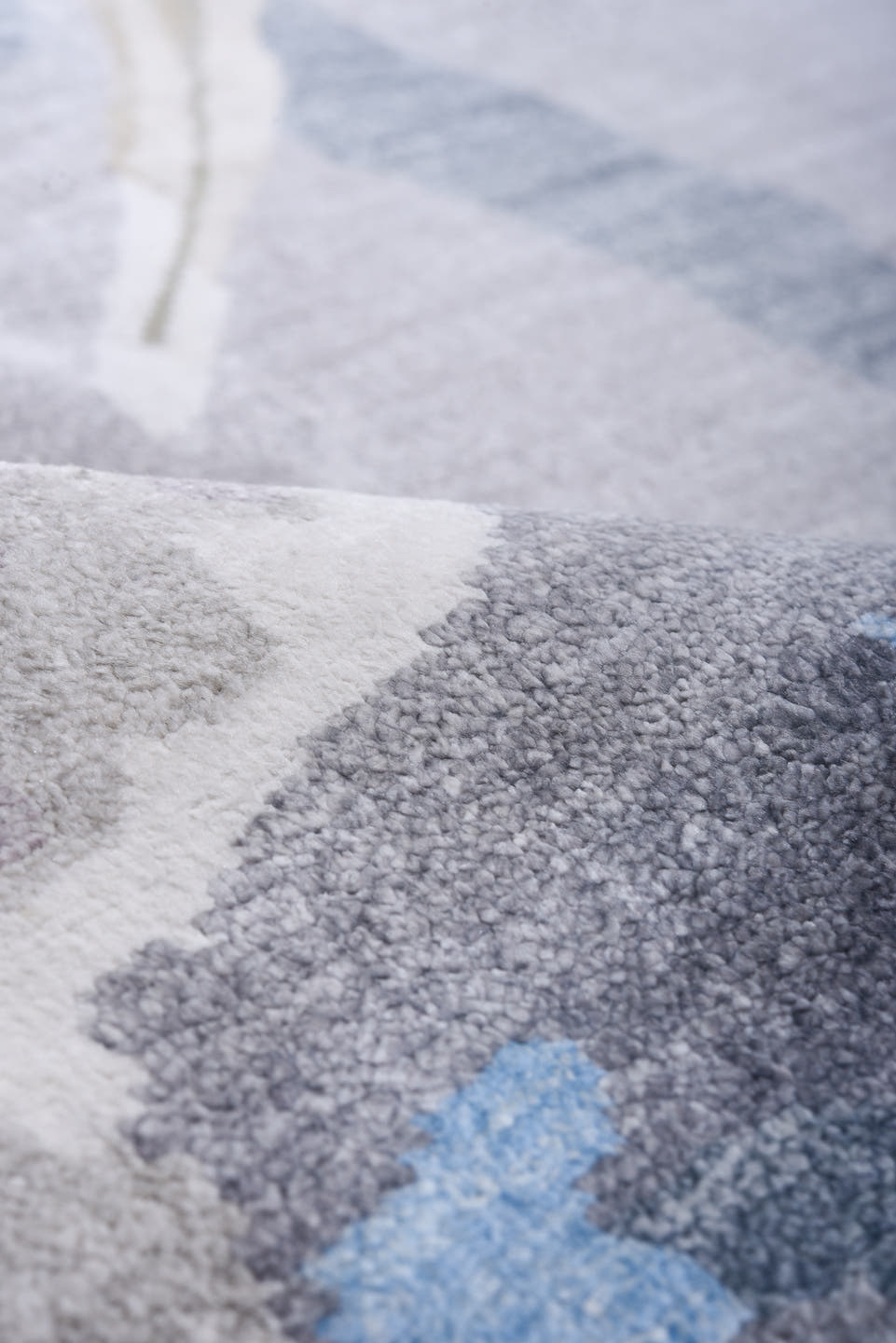 8' x 9' one-of-a-kind handmade handmade Contemporary rug. Color palette: gray, taupe, ivory, sky blue, beige, charcoal, aqua