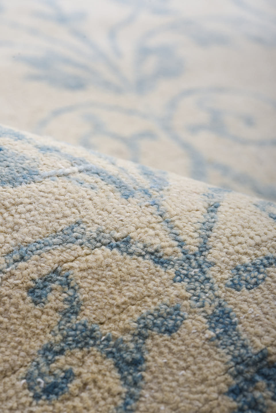8' x 11' one-of-a-kind handmade vintage European large size rug. Color palette: ivory, pale blue, cream, sky blue, taupe