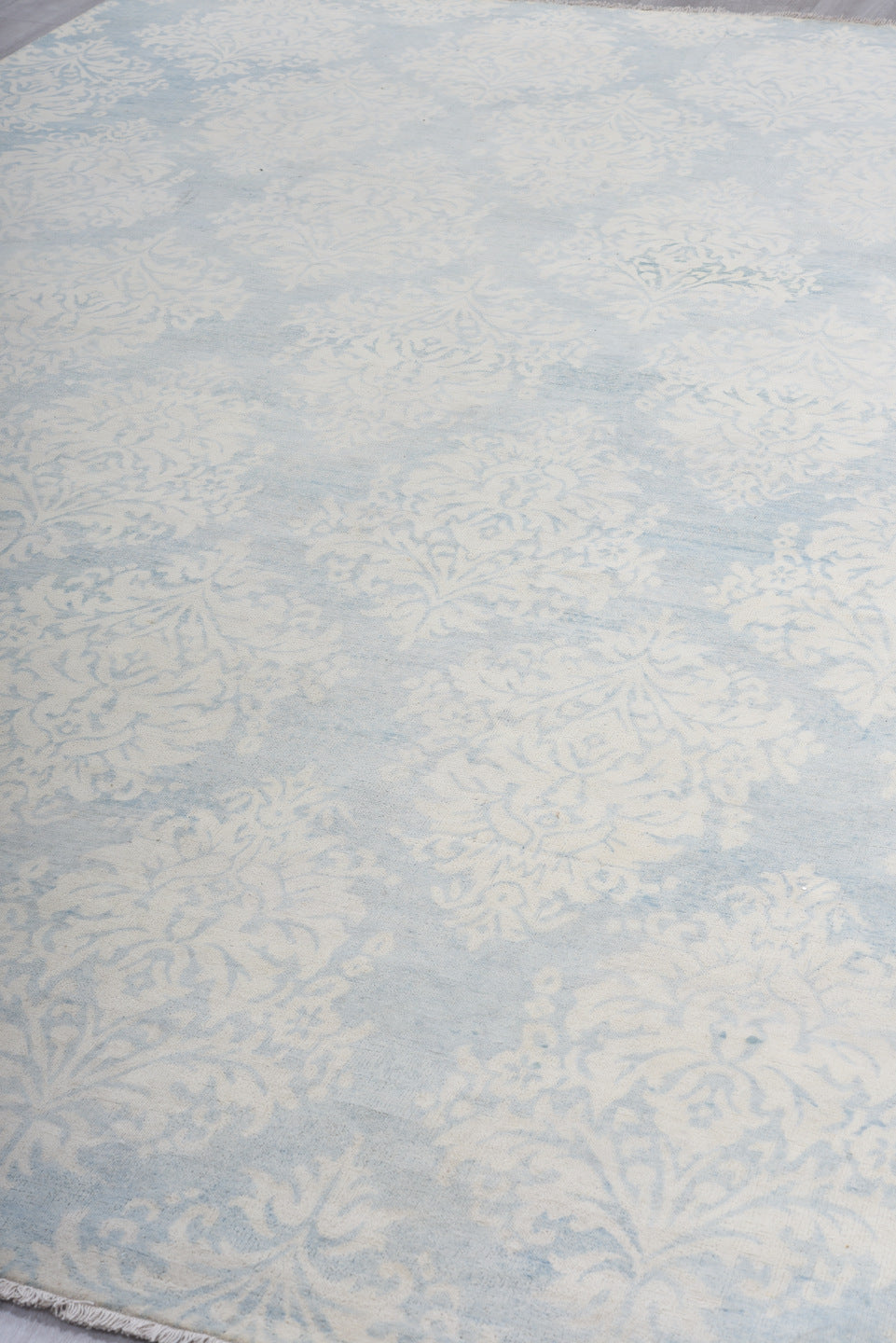 8' x 11' one-of-a-kind handmade vintage European large size rug. Color palette: ivory, pale blue, sky blue, cream, silver