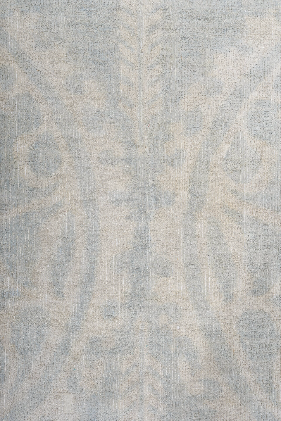 7' x 9' one-of-a-kind handmade vintage European rug. Color palette: pale blue, ivory, cream, silver, taupe, light blue, gray