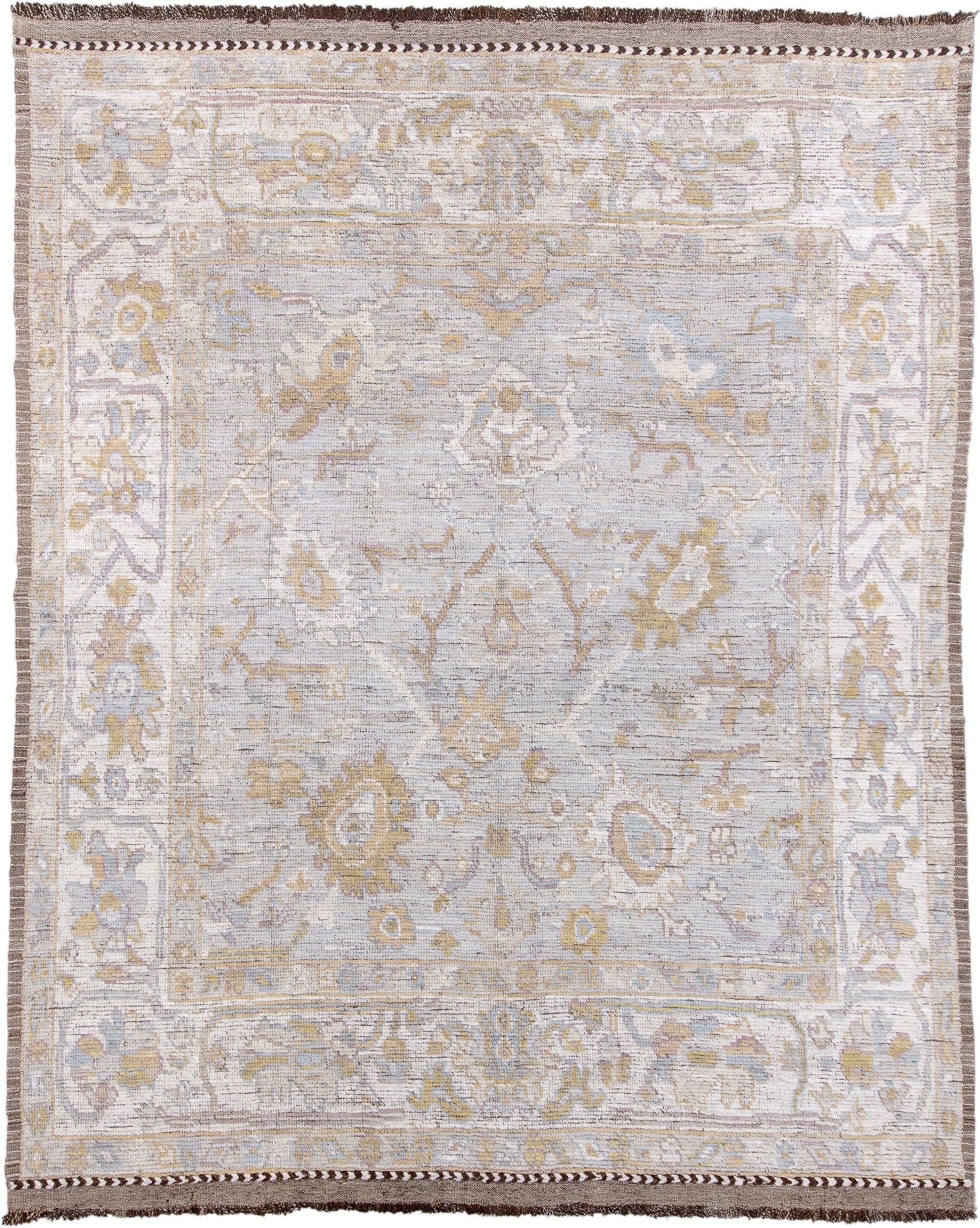9' x 12' one-of-a-kind handmade vintage Tulu large size rug. Color palette: ivory, light gray, gold, blush, pale blue, taupe