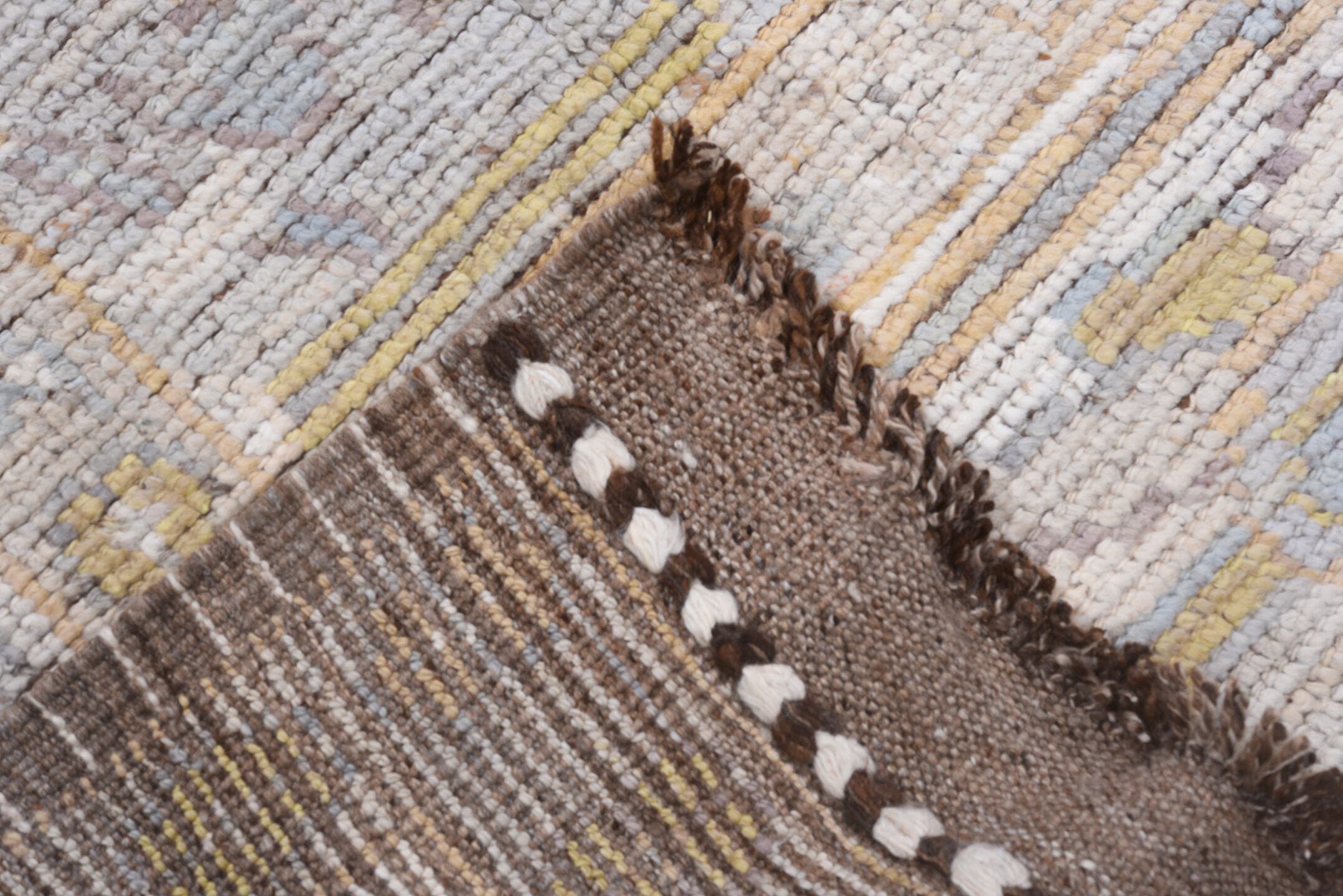 9' x 12' one-of-a-kind handmade vintage Tulu large size rug. Color palette: ivory, light gray, gold, blush, pale blue, taupe