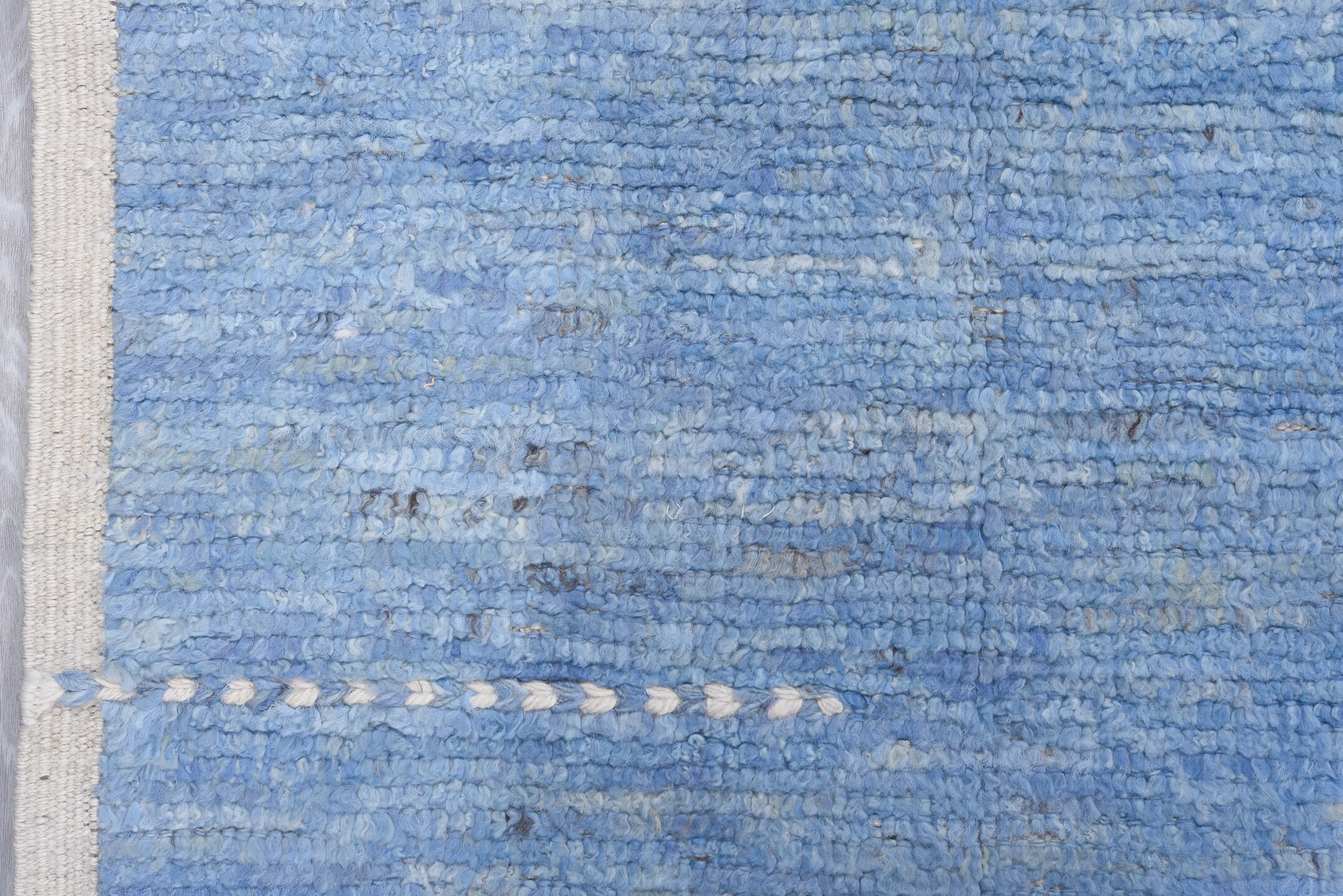 9' x 12' one-of-a-kind handmade vintage Tulu large size rug. Color palette: sky blue, ivory, slate, taupe, light blue, gray
