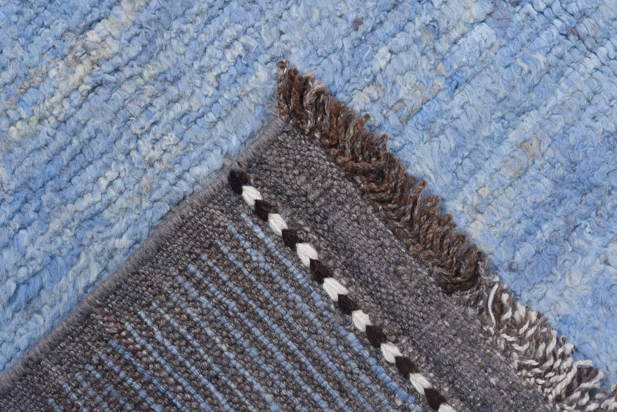 8' x 9' one-of-a-kind handmade vintage Tulu rug. Color palette: sky blue, taupe, ivory, slate, charcoal, light blue, beige