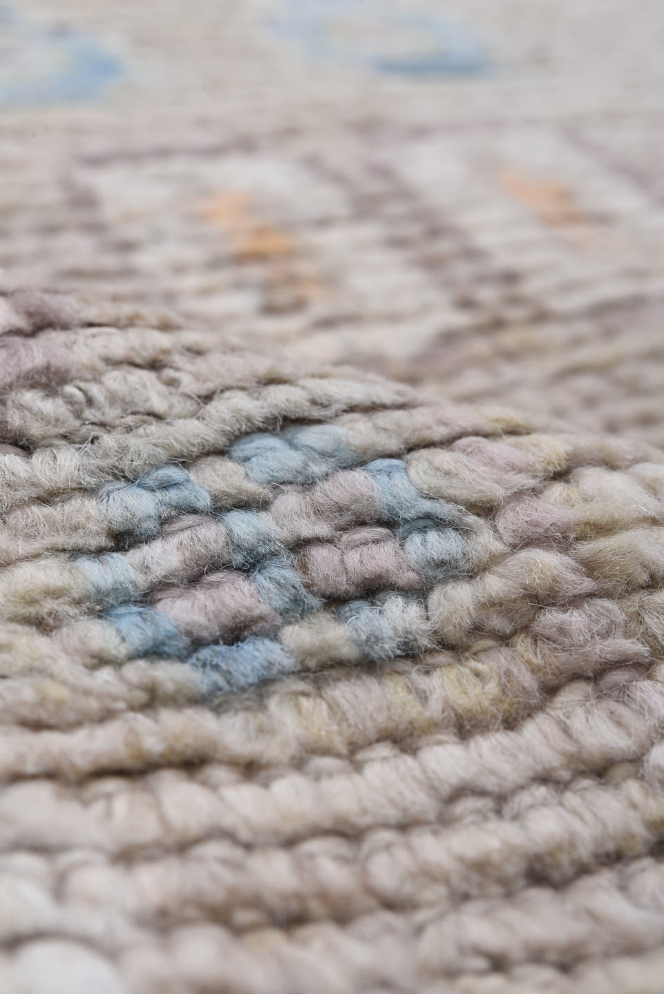 8' x 9' one-of-a-kind handmade vintage Tulu rug. Color palette: taupe, ivory, pale blue, beige, gold, blush, gray, camel