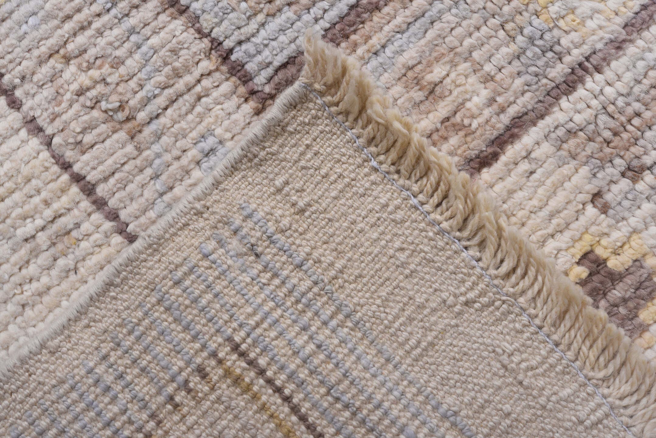 10' x 13' one-of-a-kind handmade vintage Tulu large size rug. Color palette: ivory, light blue, taupe, beige, pale gold