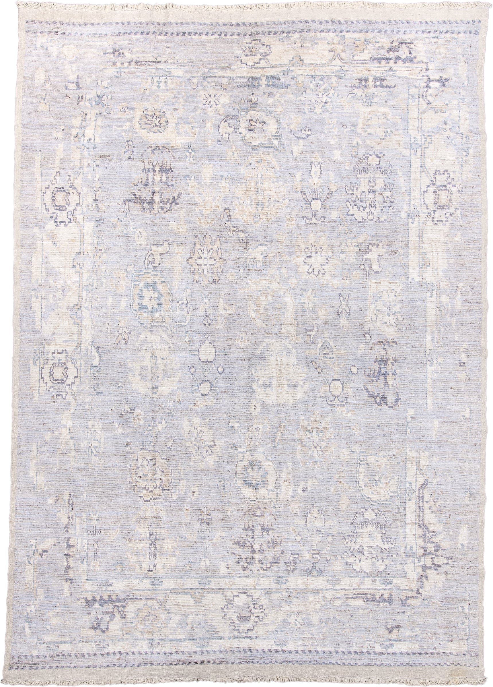 9' x 13' one-of-a-kind handmade vintage Tulu large size rug. Color palette: ivory, pale blue, lavender, cream, taupe