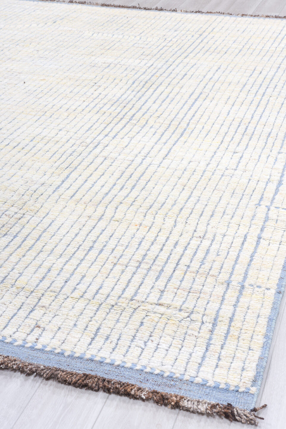 9' x 12' one-of-a-kind handmade vintage Tulu large size rug. Color palette: ivory, pale blue, brown, light blue