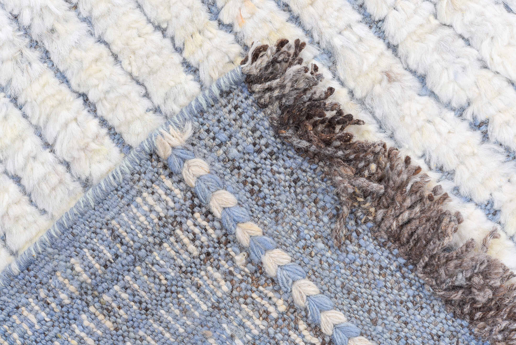 9' x 12' one-of-a-kind handmade vintage Tulu large size rug. Color palette: ivory, pale blue, brown, light blue