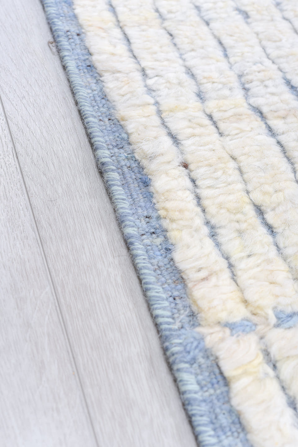 9' x 12' one-of-a-kind handmade vintage Tulu large size rug. Color palette: ivory, pale blue, brown, light blue