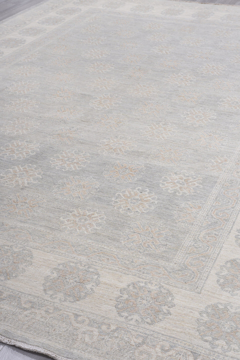 10' x 14' one-of-a-kind handmade vintage Khotan large size rug. Color palette: ivory, pale blue, light gray, cream, taupe