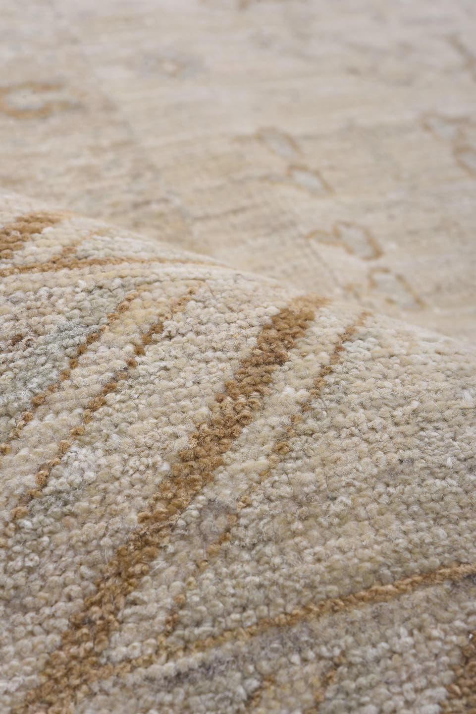 8' x 11' one-of-a-kind handmade vintage Khotan large size rug. Color palette: ivory, cream, beige, taupe, camel, pale gold