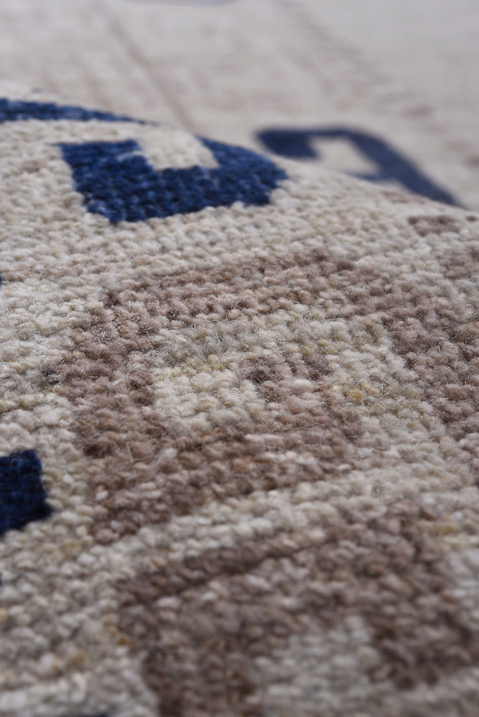 12' x 19' one-of-a-kind handmade vintage Khotan oversize rug. Color palette: ivory, cobalt, taupe, beige, slate, blue, gray