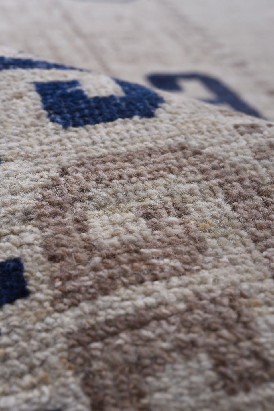 12' x 19' one-of-a-kind handmade vintage Khotan oversize rug. Color palette: ivory, cobalt, taupe, beige, slate, blue, gray