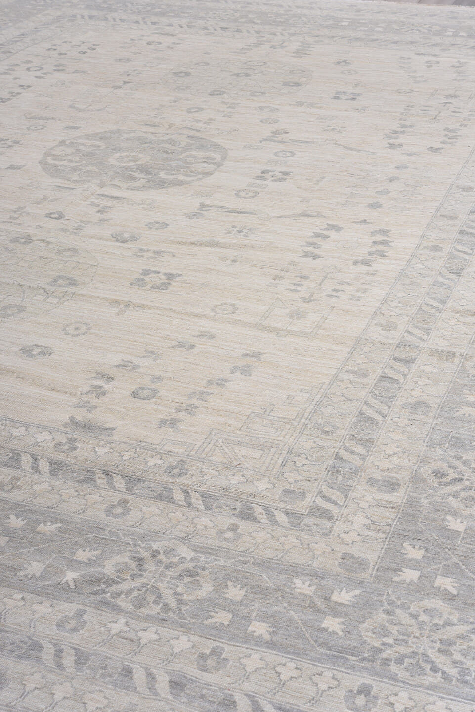 13' x 17' one-of-a-kind handmade vintage Khotan oversize rug. Color palette: ivory, pale gray, taupe, cream, beige