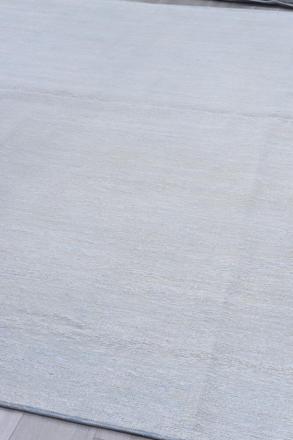 10' x 13' one-of-a-kind handmade vintage Sari Silk large size rug. Color palette: pale blue, silver, ivory, light blue, gray