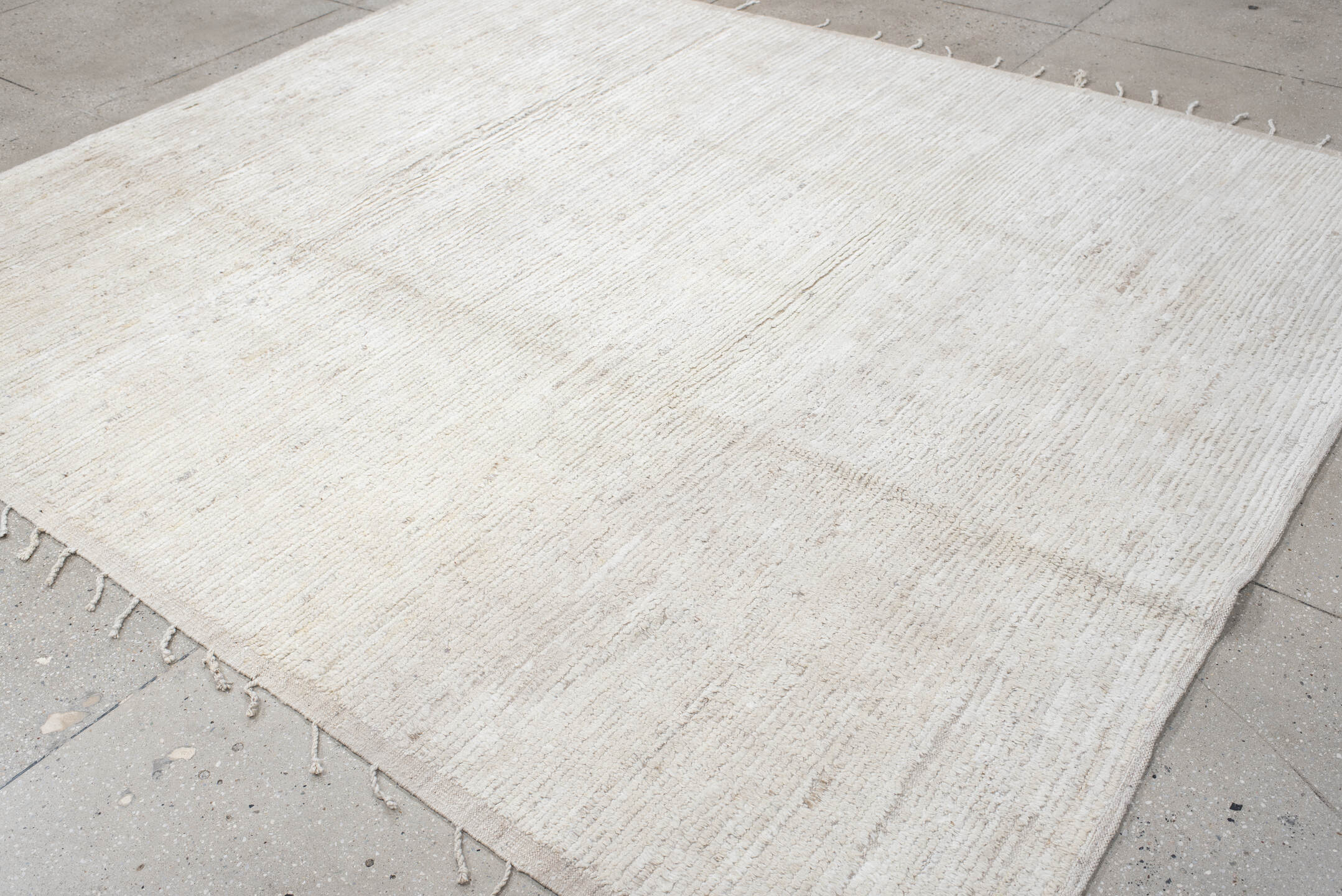 8' x 9' one-of-a-kind handmade vintage Tulu rug. Color palette: ivory, cream, beige, taupe, gray