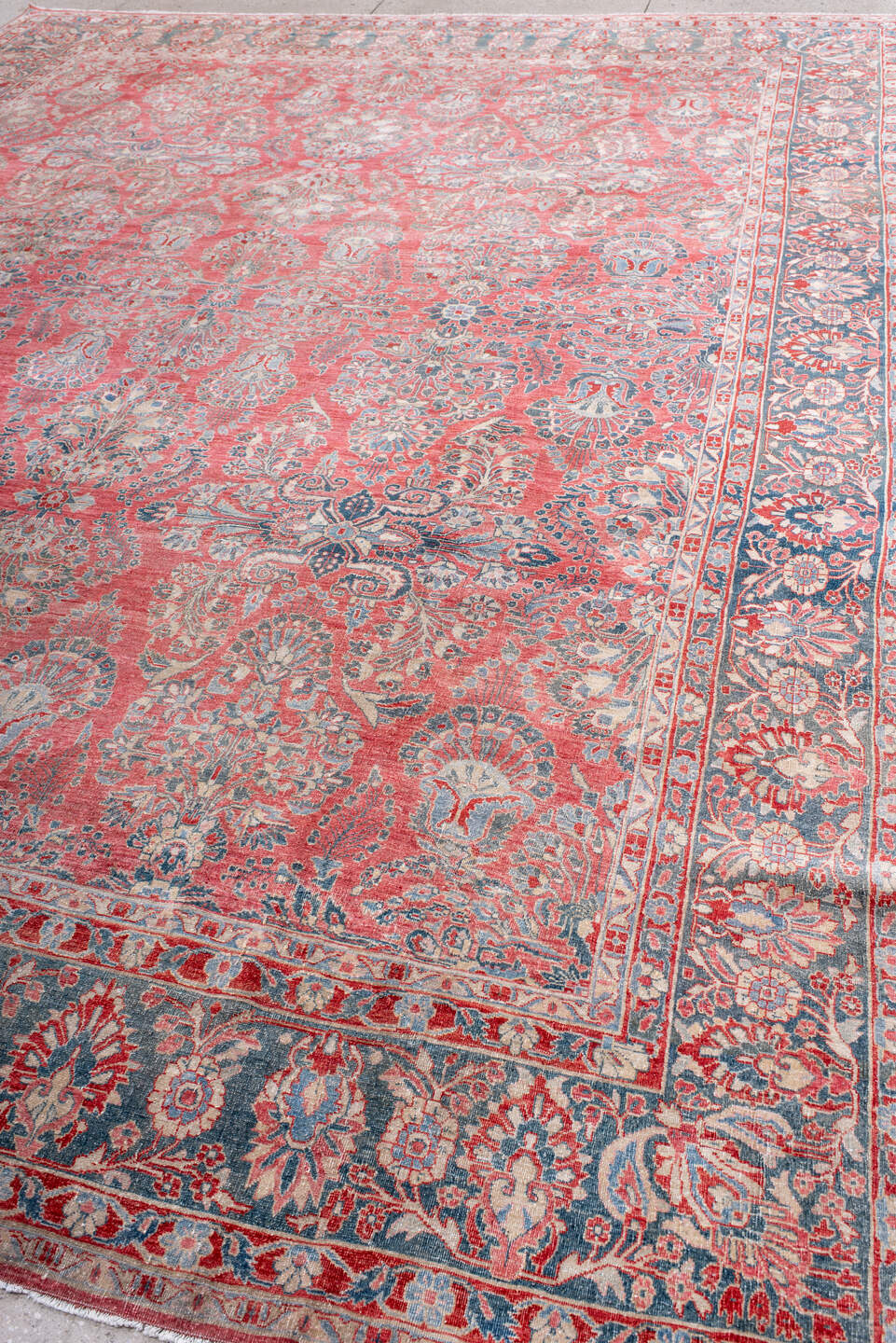 13' x 10' one-of-a-kind handmade vintage rug. Color palette: coral, blue, ivory, rose, slate, crimson, terracotta, pink