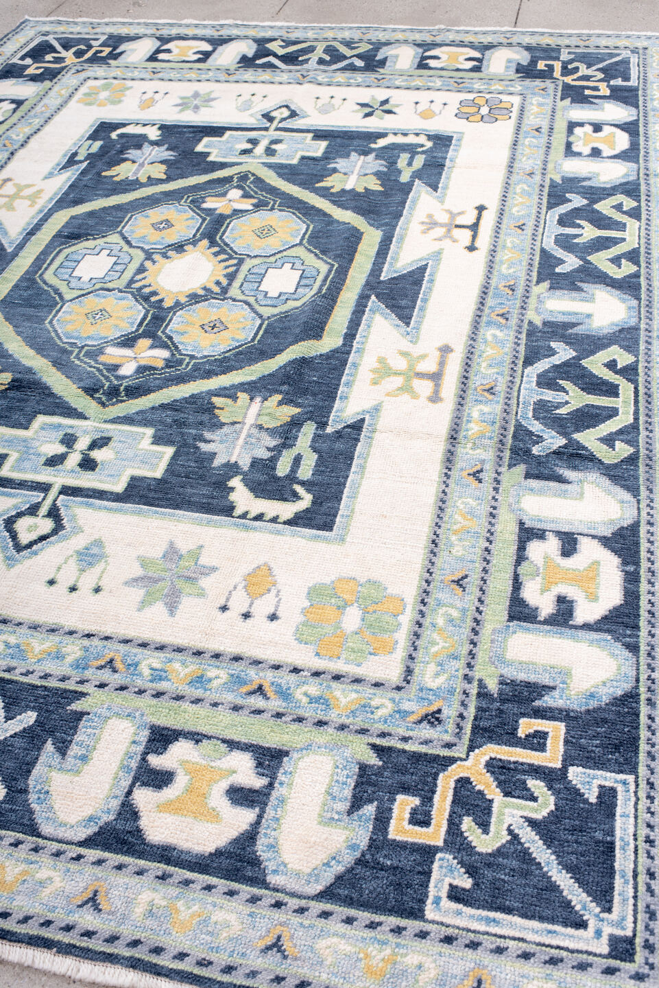 8' x 10' one-of-a-kind handmade vintage Oushak large size rug. Color palette: ivory, navy, sky_blue, sage, gold, pale_blue