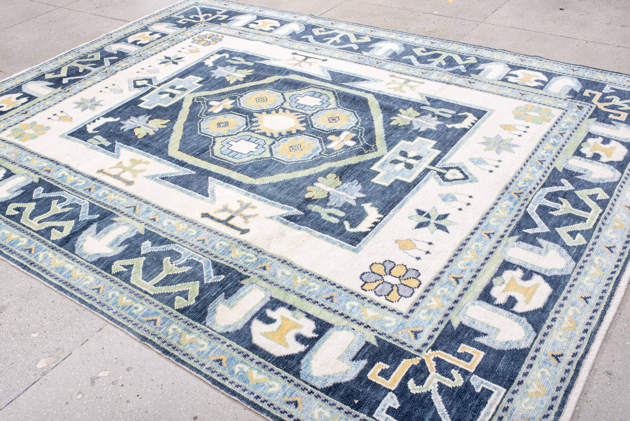 8' x 10' one-of-a-kind handmade vintage Oushak large size rug. Color palette: ivory, navy, sky_blue, sage, gold, pale_blue