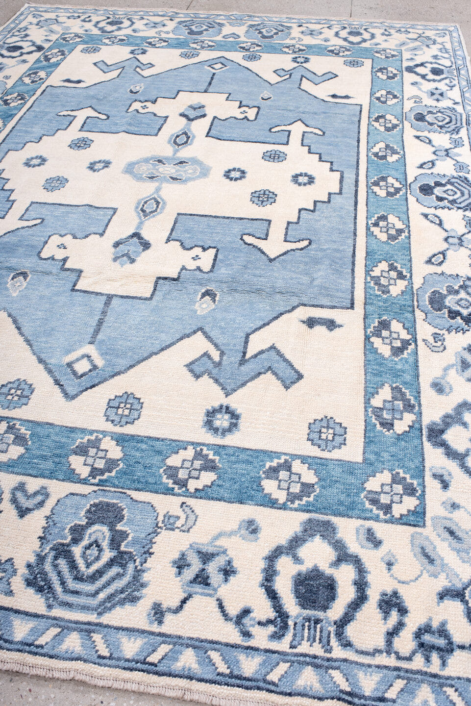 8' x 11' one-of-a-kind handmade vintage Oushak large size rug. Color palette: ivory, sky blue, slate blue, powder blue
