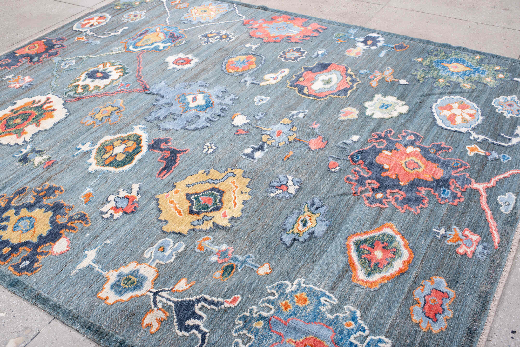 8' x 10' one-of-a-kind handmade vintage Oushak large size rug. Color palette: blue-gray, ivory, coral, slate, gold, navy