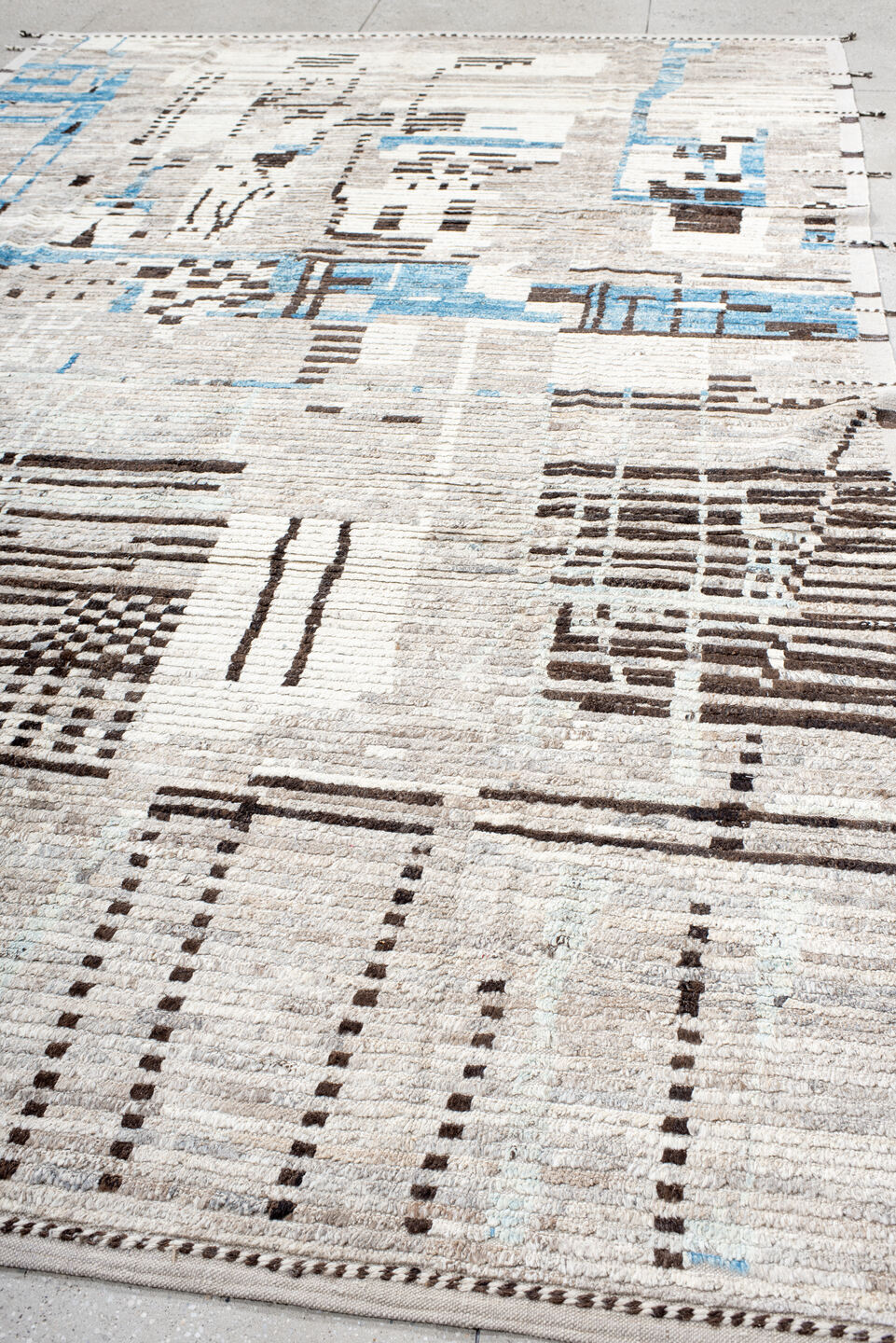8' x 12' one-of-a-kind handmade vintage Tulu large size rug. Color palette: ivory, charcoal, sky blue, taupe, cream, gray