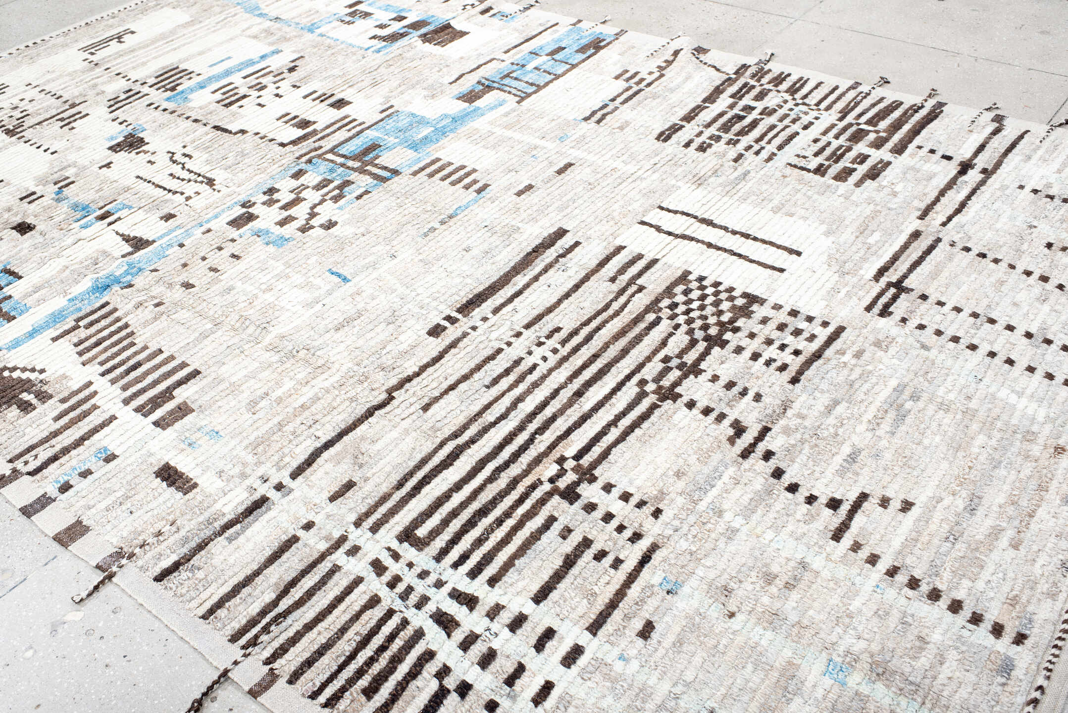 8' x 12' one-of-a-kind handmade vintage Tulu large size rug. Color palette: ivory, charcoal, sky blue, taupe, cream, gray