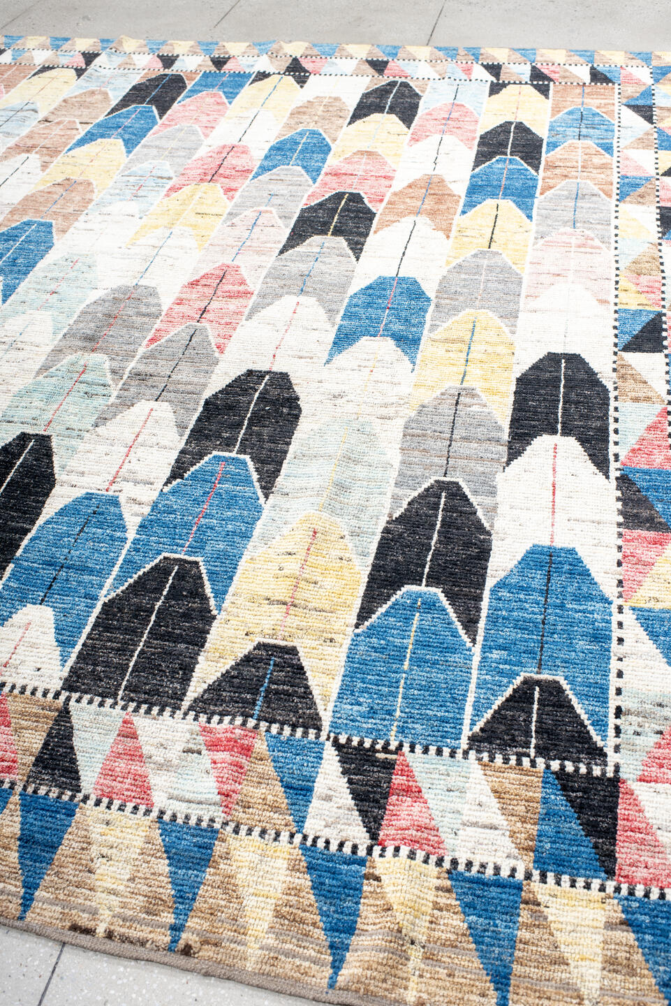 9' x 11' one-of-a-kind handmade vintage Tulu large size rug. Color palette: ivory, blue, charcoal, yellow, rose, taupe