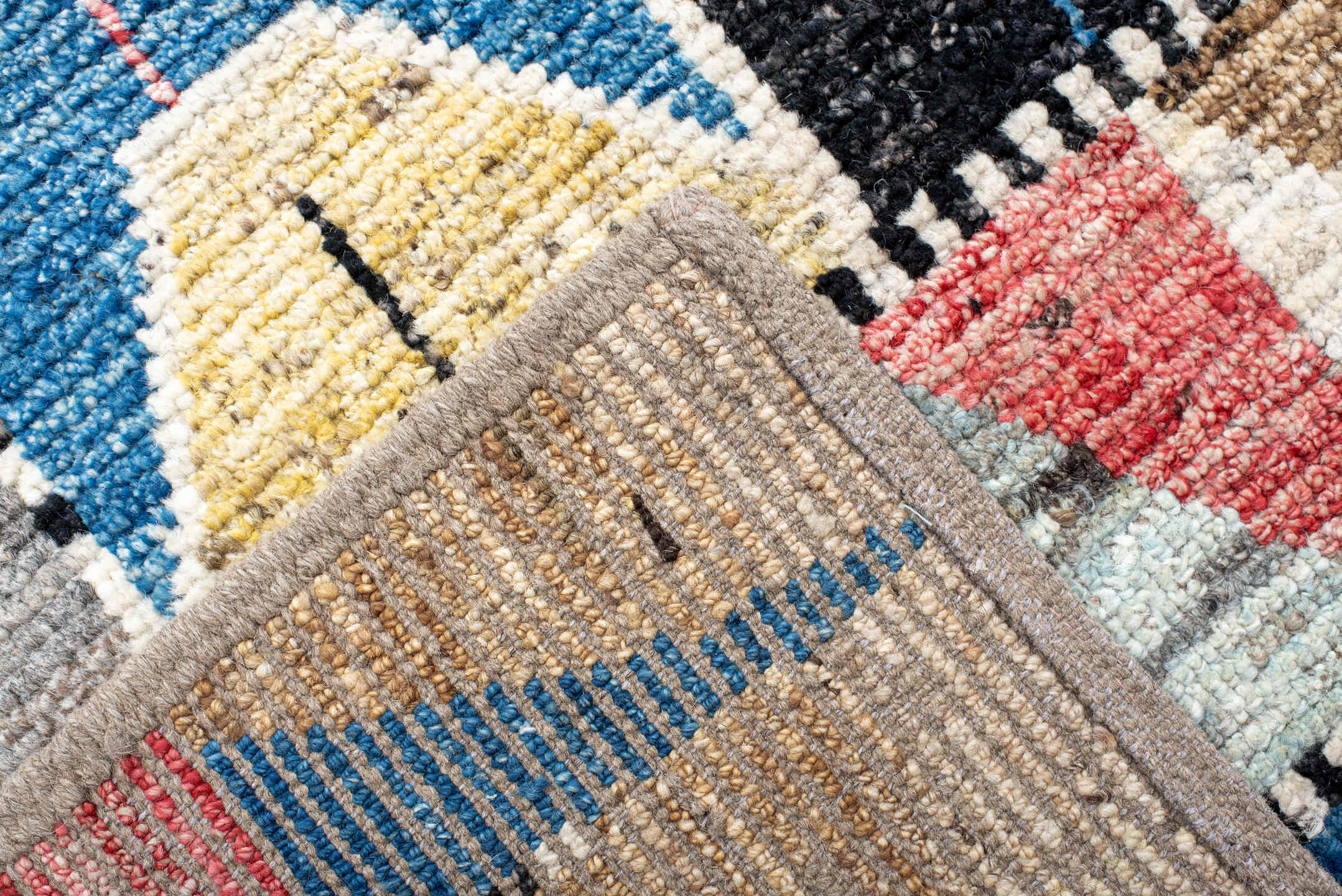 9' x 11' one-of-a-kind handmade vintage Tulu large size rug. Color palette: ivory, blue, charcoal, yellow, rose, taupe