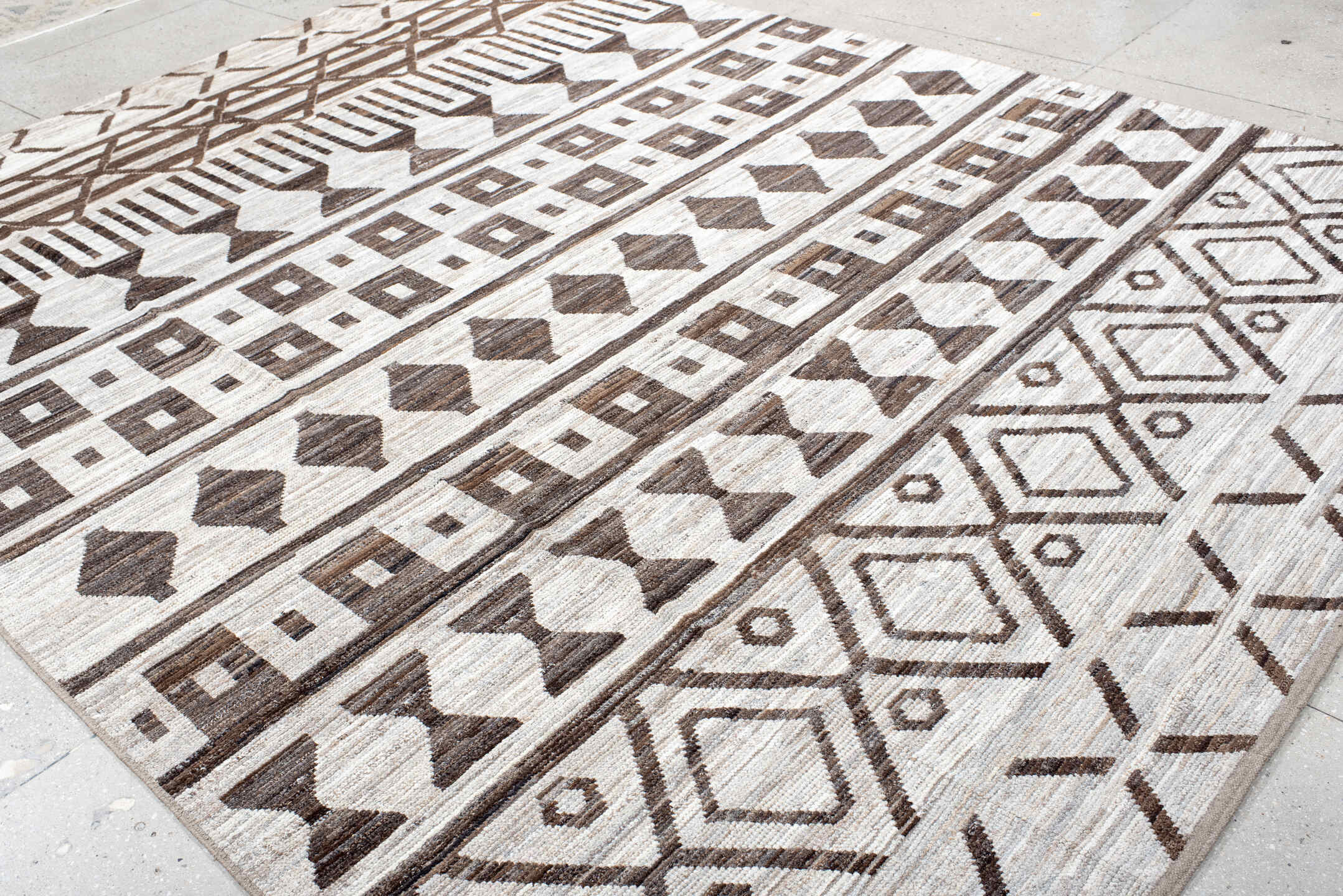 9' x 12' one-of-a-kind handmade vintage Tulu large size rug. Color palette: ivory, brown, taupe, beige, gray