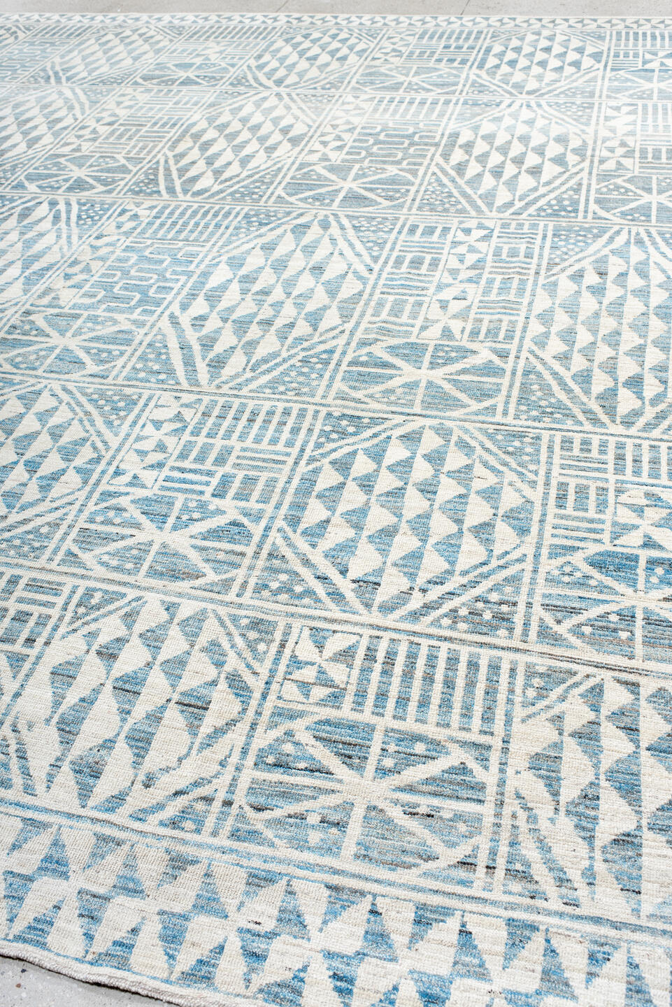 12' x 14' one-of-a-kind handmade vintage Tulu oversize rug. Color palette: ivory, sky blue, powder blue, light blue