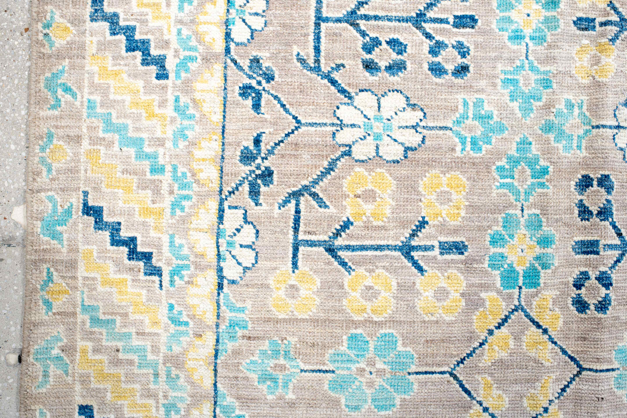 9' x 12' one-of-a-kind handmade vintage Khotan large size rug. Color palette: antiquewhite, blue, brown, cornsilk, dark gray