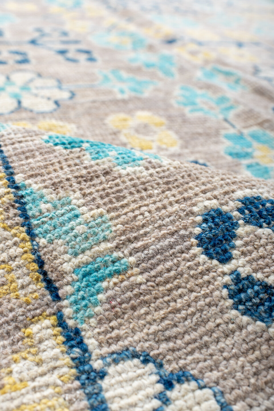 9' x 12' one-of-a-kind handmade vintage Khotan large size rug. Color palette: antiquewhite, blue, brown, cornsilk, dark gray