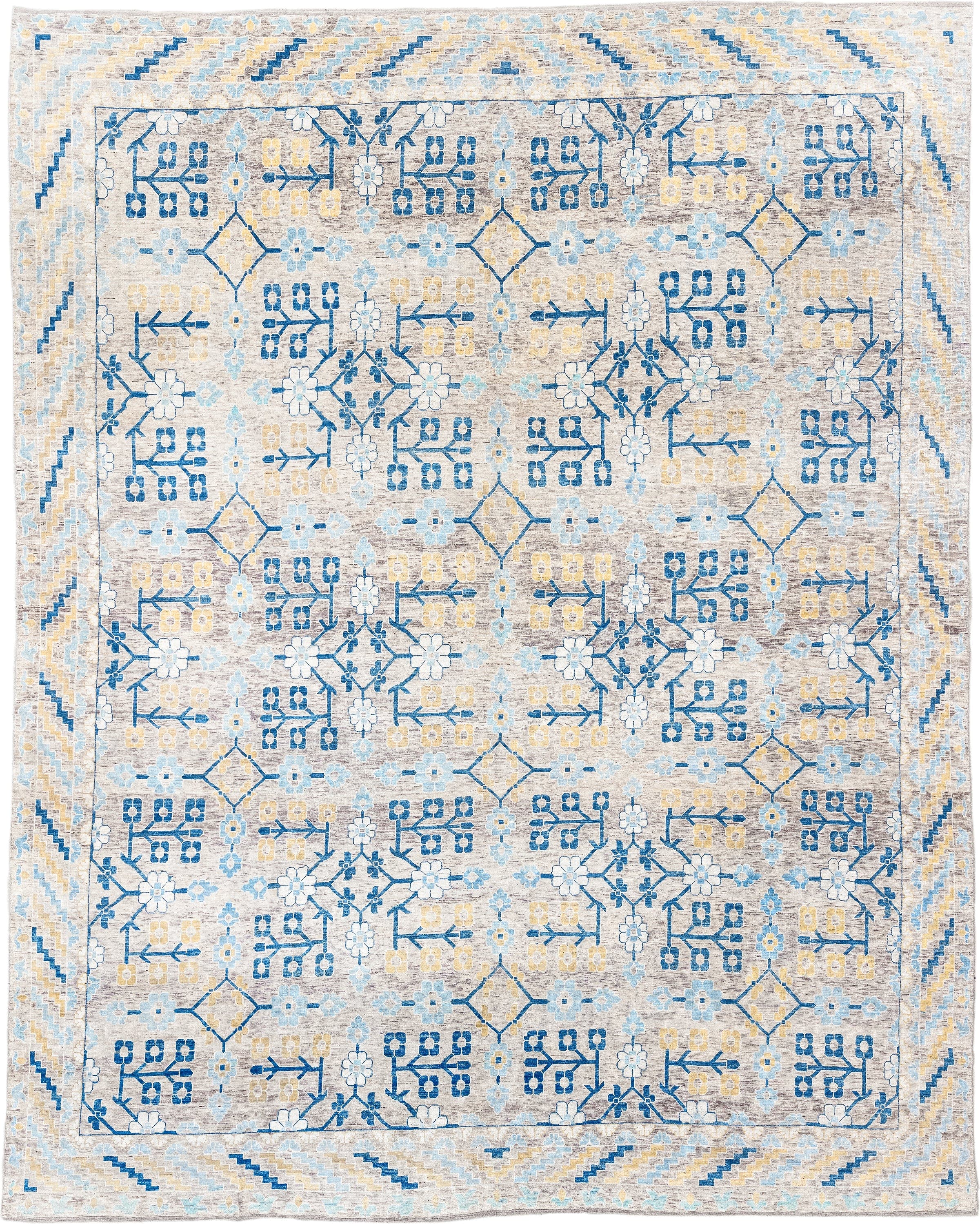 13' x 17' one-of-a-kind handmade vintage Khotan oversize rug. Color palette: ivory, light blue, cobalt, gold, taupe, blue