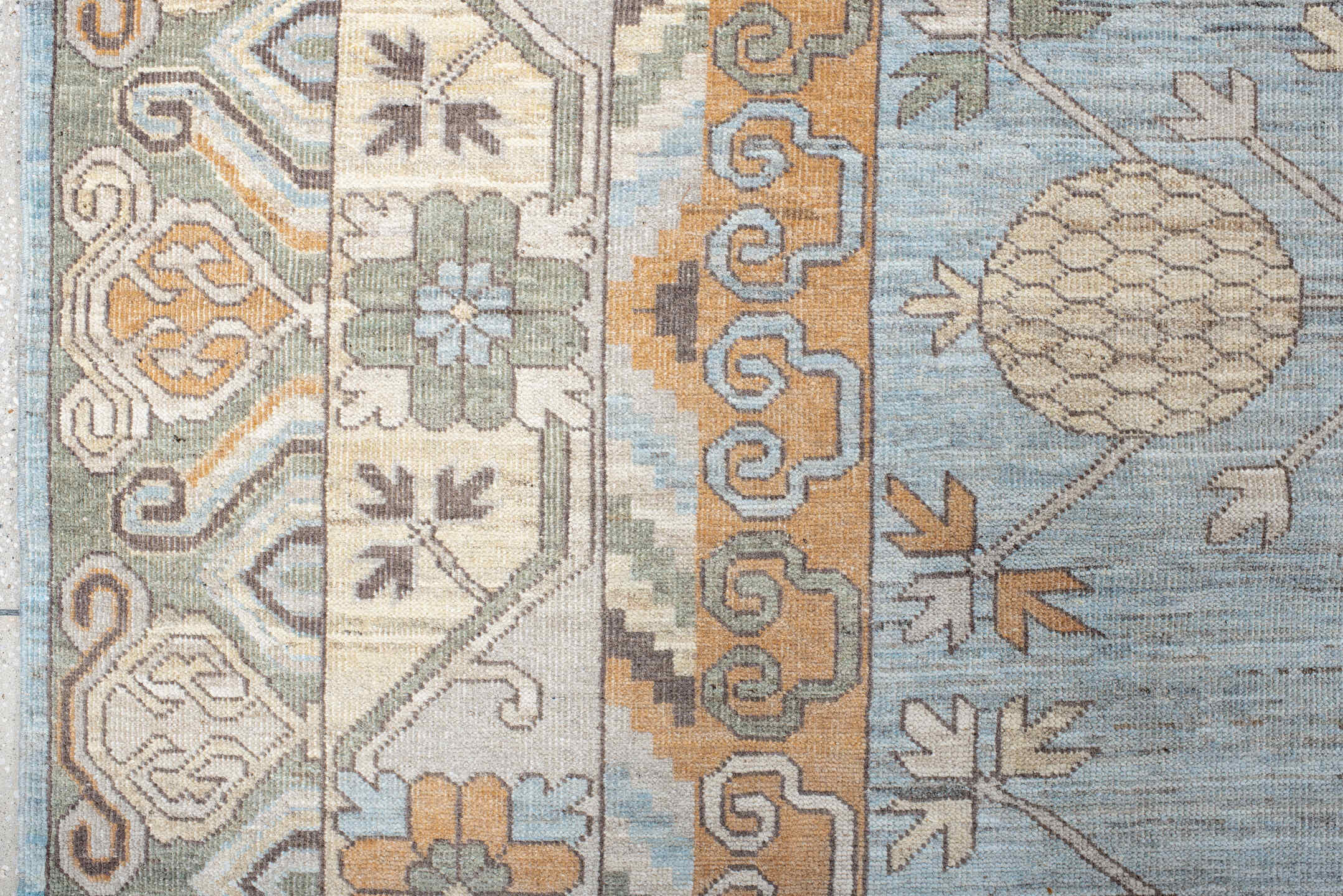 13' x 19' one-of-a-kind handmade vintage Khotan oversize rug. Color palette: pale blue, ivory, peach, taupe, sage, camel