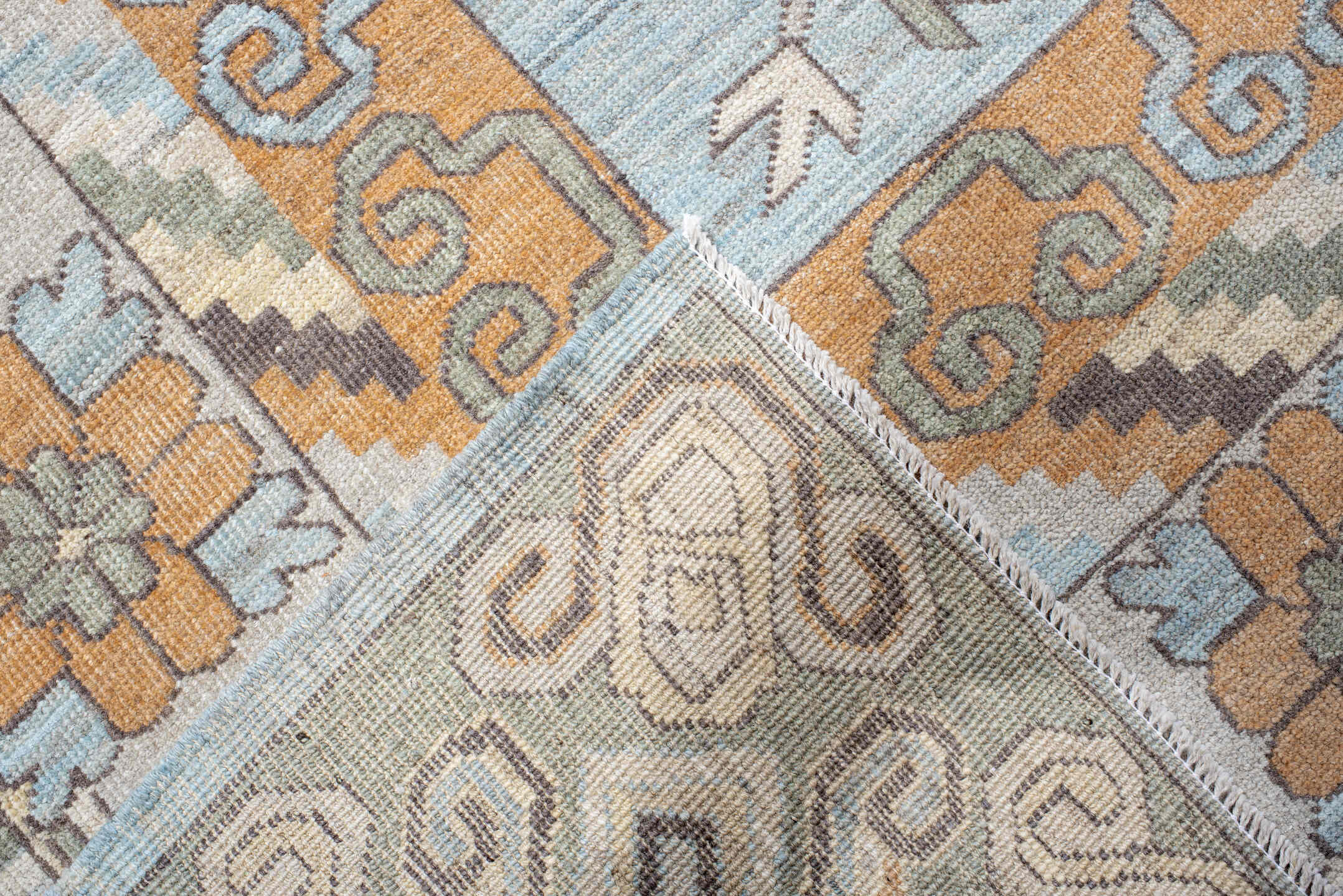13' x 19' one-of-a-kind handmade vintage Khotan oversize rug. Color palette: pale blue, ivory, peach, taupe, sage, camel