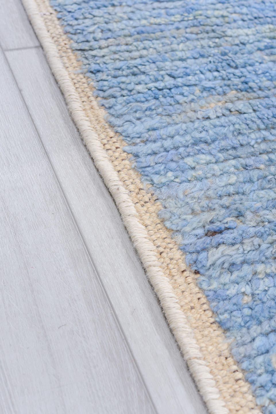 8' x 9' one-of-a-kind handmade vintage Tulu rug. Color palette: pale blue, ivory, charcoal, sky blue, light blue, gray