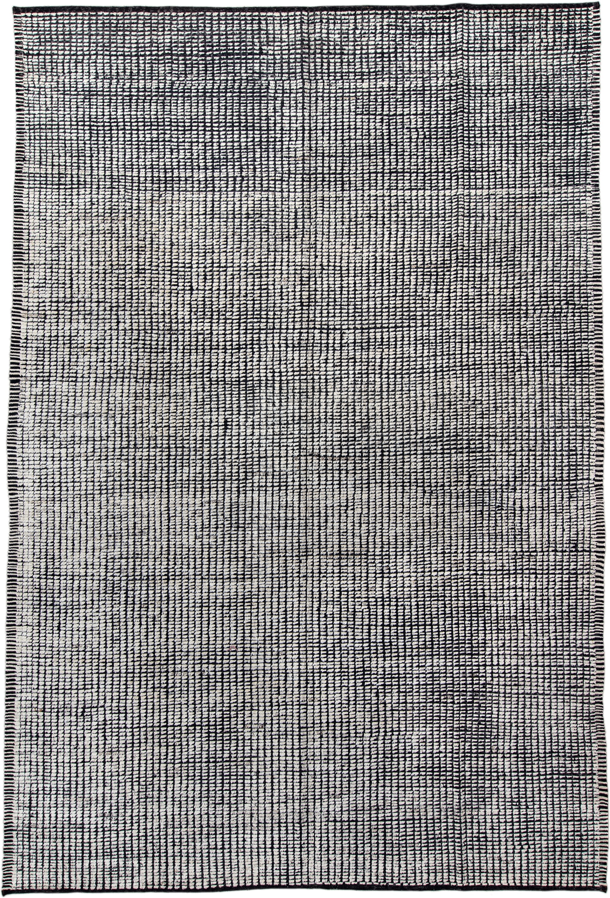 9' x 13' one-of-a-kind handmade vintage Tulu large size rug. Color palette: ivory, charcoal, gray, black