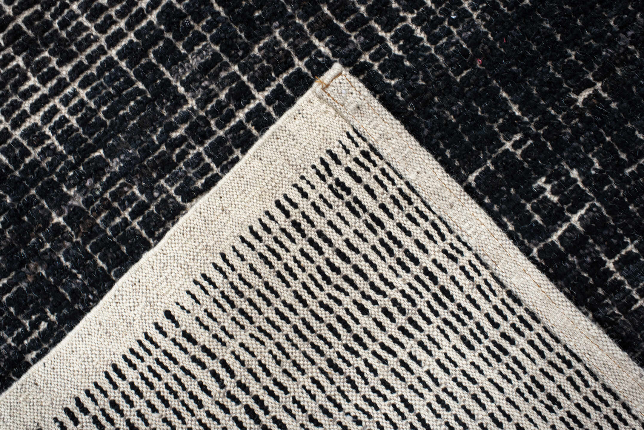 2' x 8' one-of-a-kind handmade vintage Tulu runner rug. Color palette: charcoal, ivory, gray, black