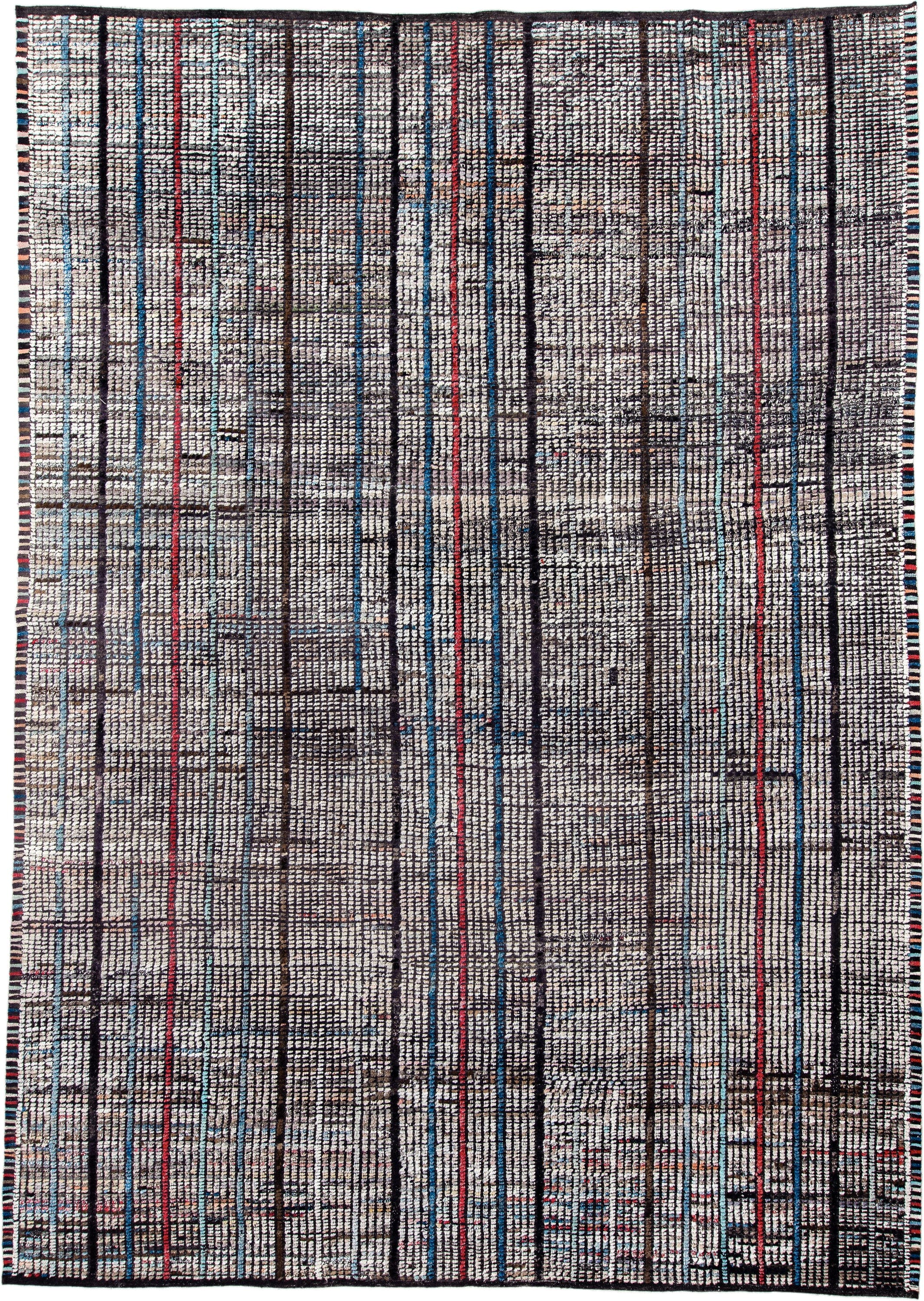 10' x 14' one-of-a-kind handmade vintage Tulu large size rug. Color palette: ivory, charcoal, slate, indigo, crimson, taupe