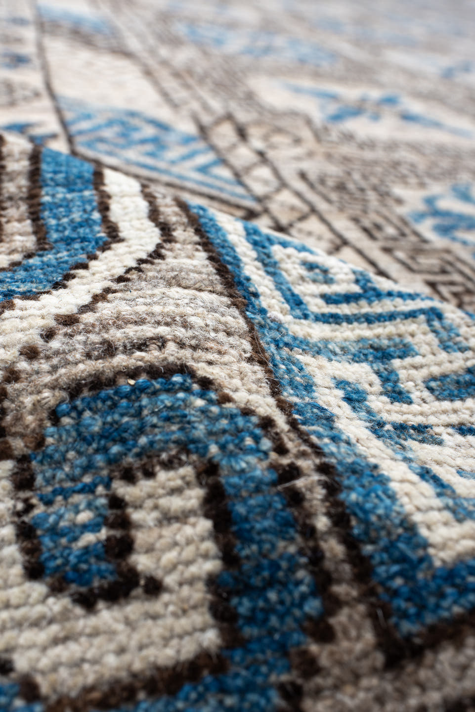 11' x 13' one-of-a-kind handmade vintage Khotan oversize rug. Color palette: ivory, sky_blue, taupe, charcoal, cream