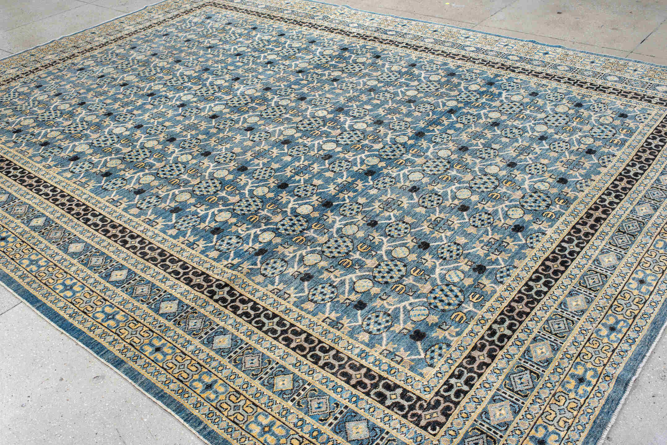 10' x 13' one-of-a-kind handmade vintage Tulu large size rug. Color palette: sky blue, ivory, navy, charcoal, cream, slate