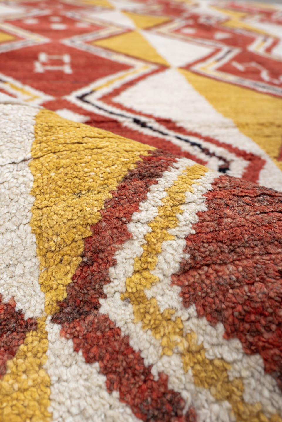 6' x 9' one-of-a-kind handmade vintage Tulu medium size rug. Color palette: rust, ivory, gold, charcoal, saffron, terracotta
