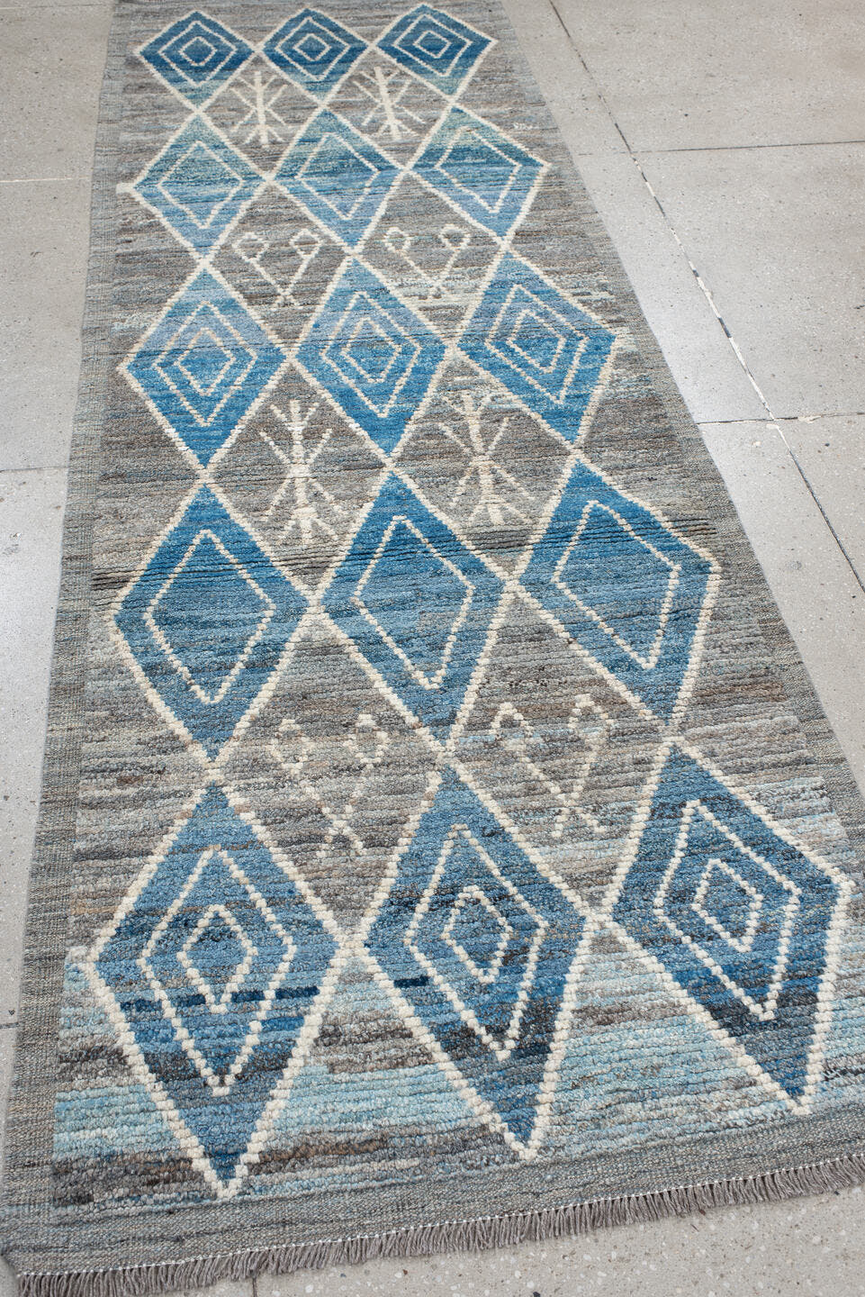 3' x 9' one-of-a-kind handmade vintage Tulu runner rug. Color palette: gray, sky blue, ivory, slate, charcoal, light blue