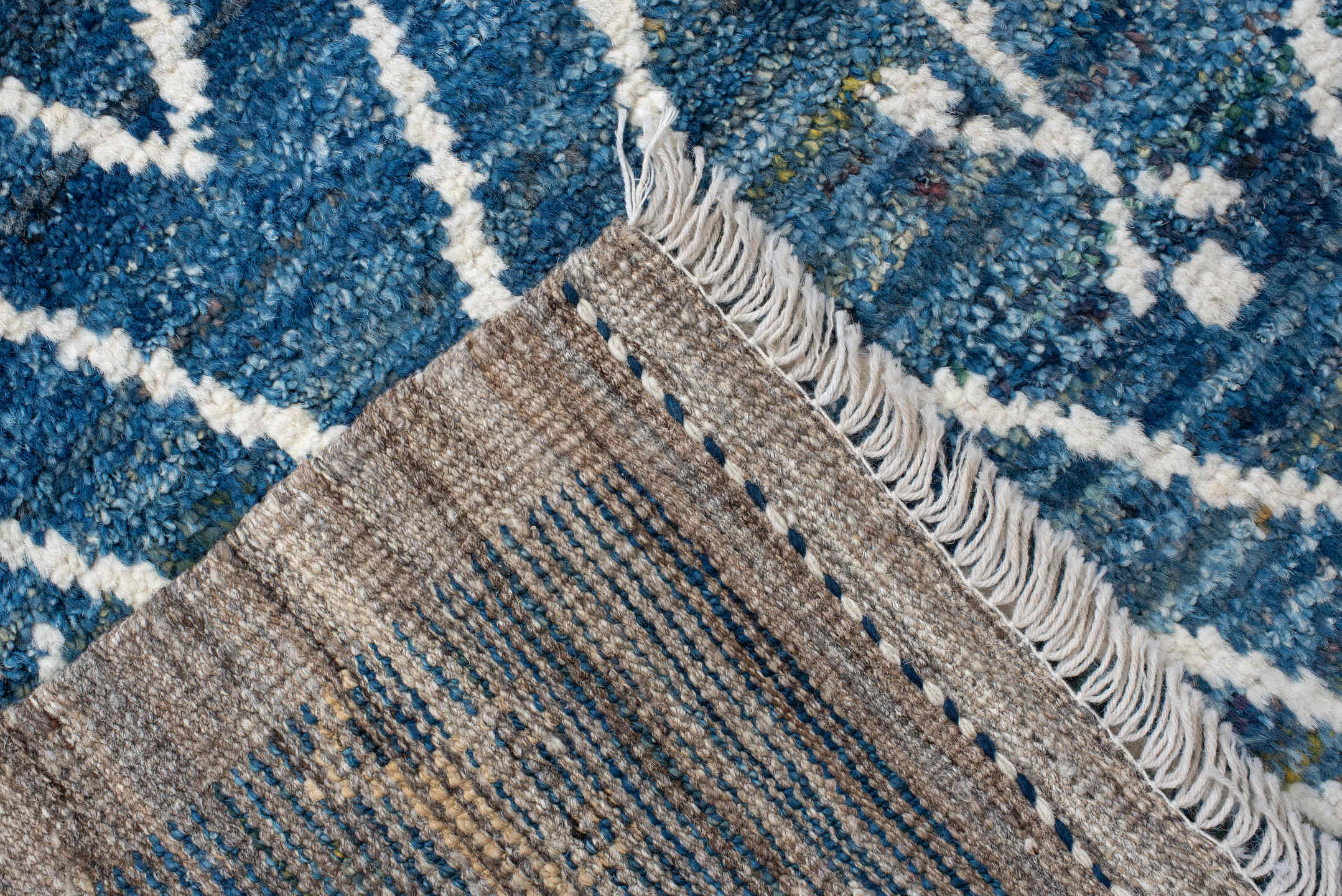 2' x 10' one-of-a-kind handmade vintage Tulu runner rug. Color palette: arapawa, blue, brown, gainsboro, gray, light blue
