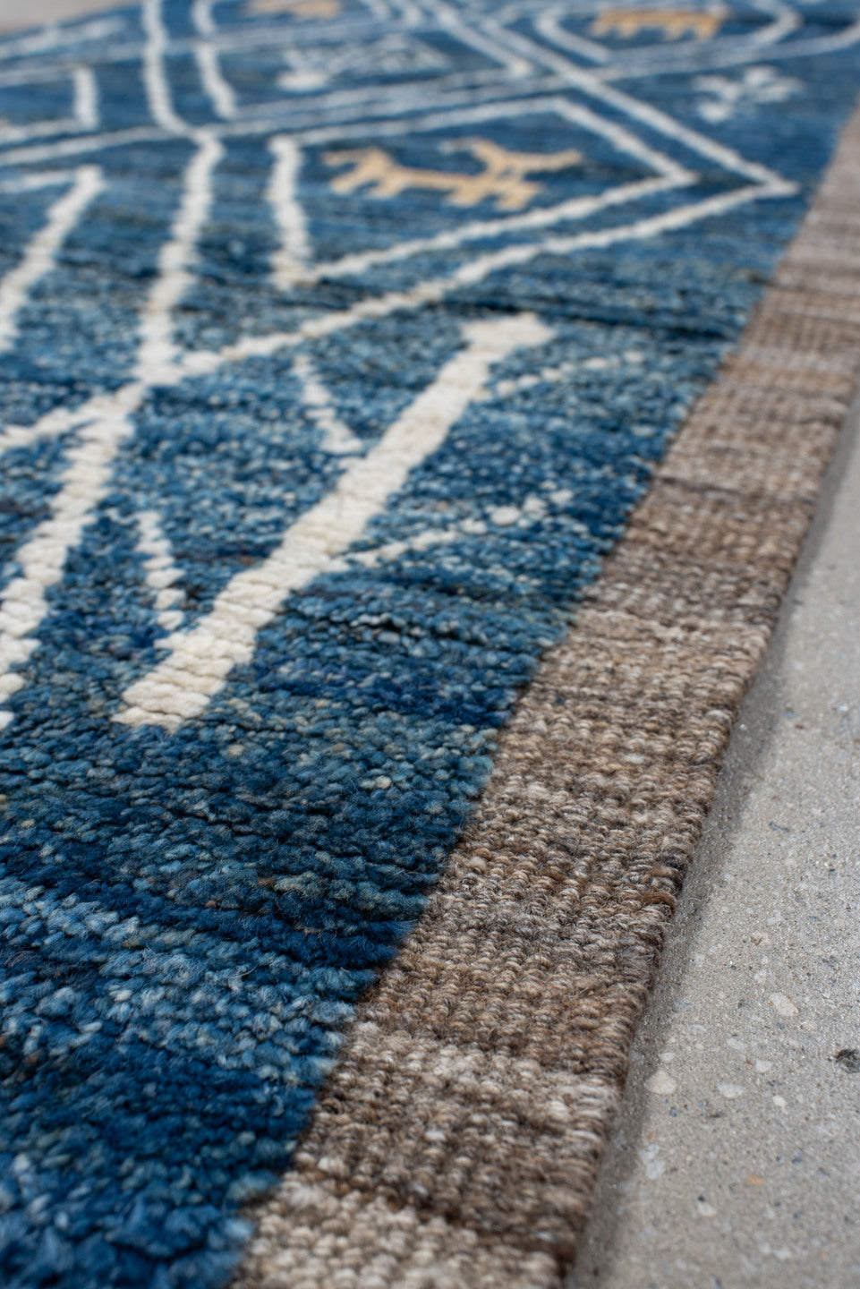 2' x 10' one-of-a-kind handmade vintage Tulu runner rug. Color palette: arapawa, blue, brown, gainsboro, gray, light blue
